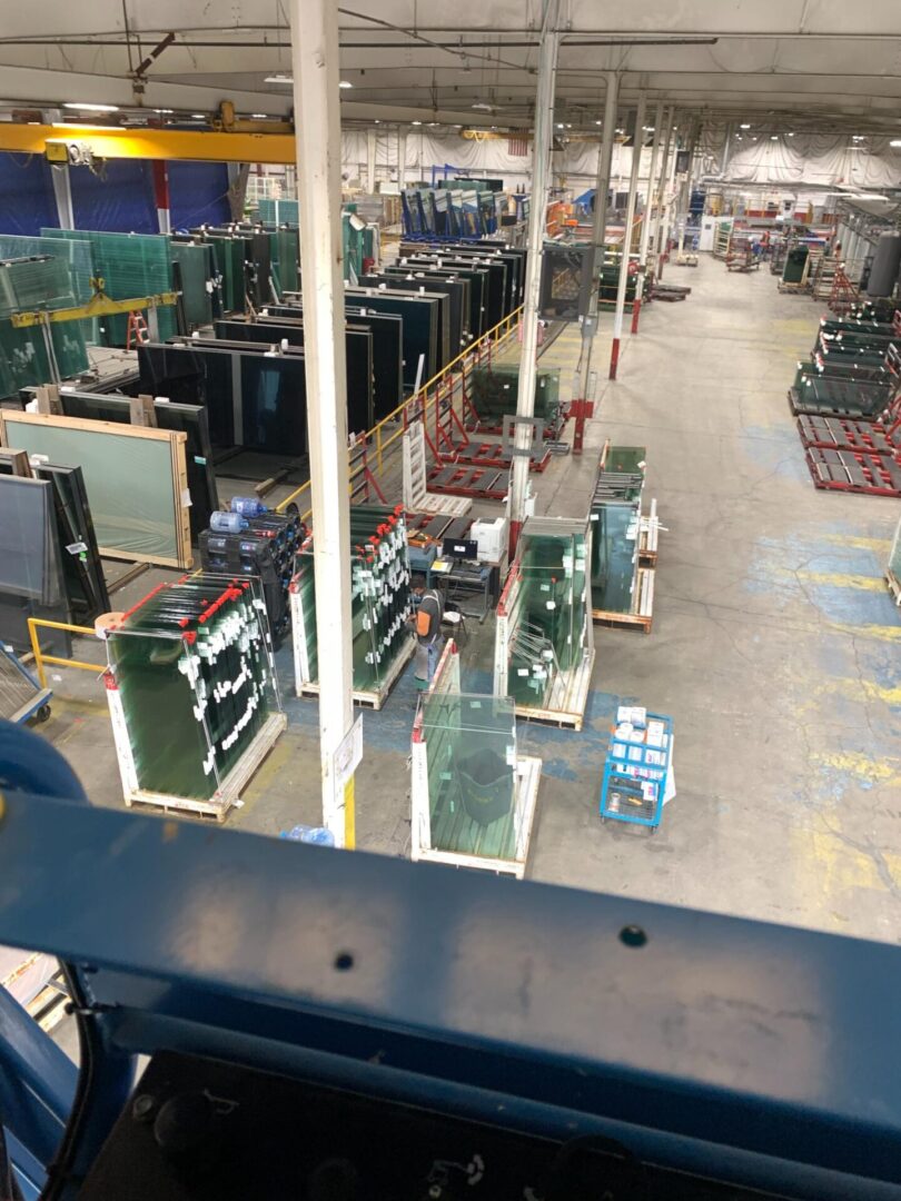 A warehouse filled with lots of glass shelves.