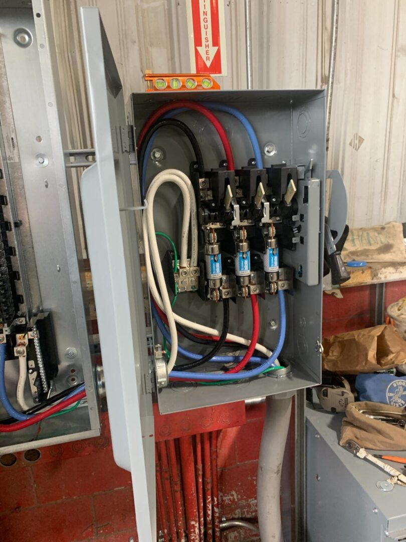 A bunch of wires are connected to the electrical box.