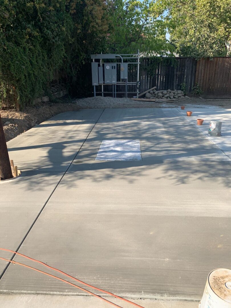 A concrete slab with some trees in the background