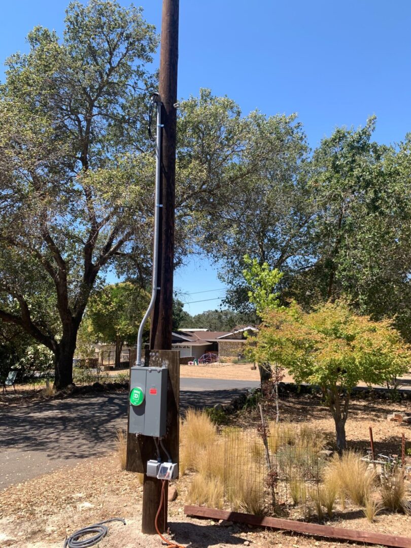 A telephone pole with wires on it in the middle of nowhere.