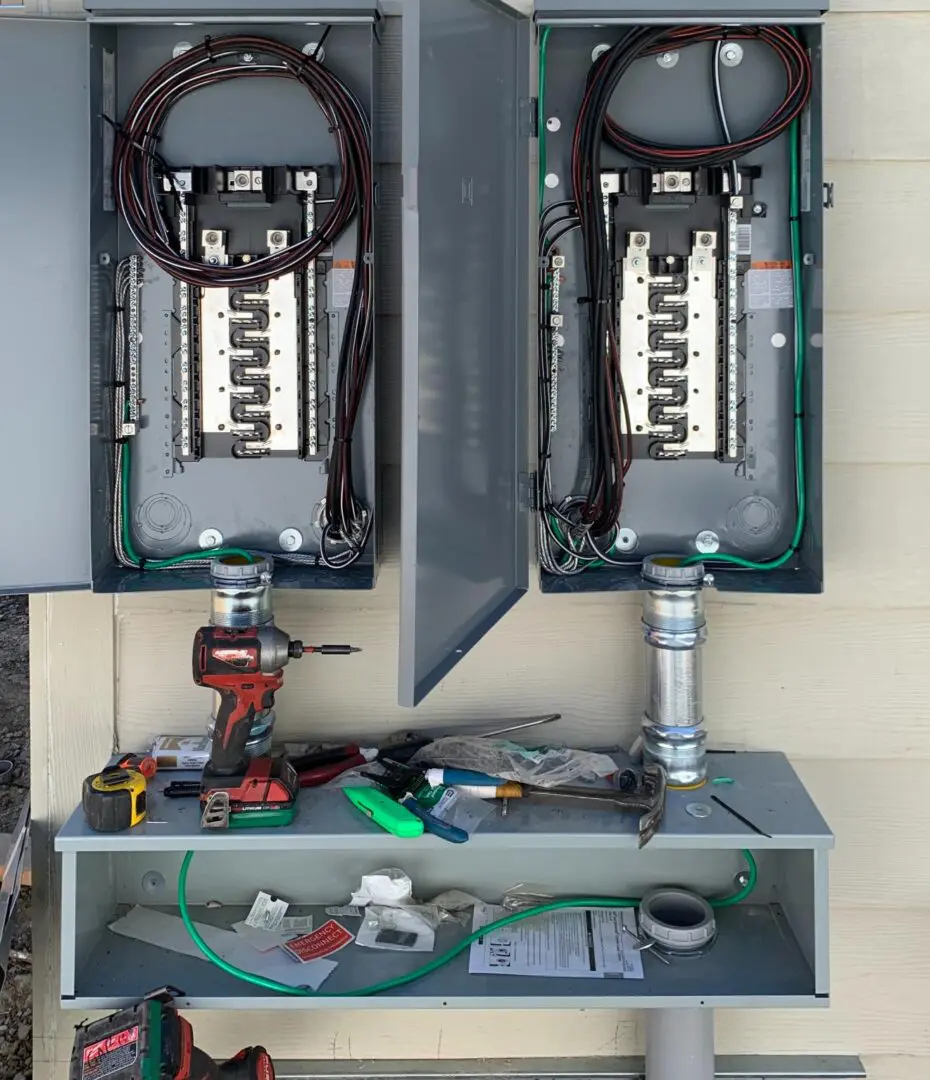 A view of an electrical panel with the wires plugged in.